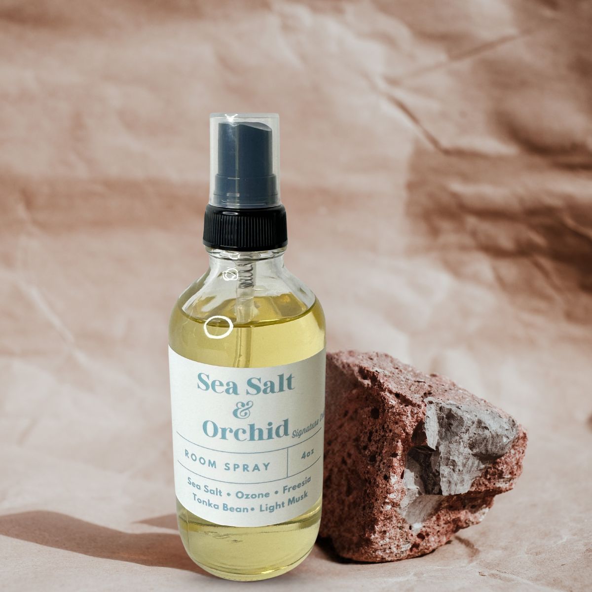 The Sea Salt Orchid room spray combines the crispness of the sea with a delicate, floral fragrance.