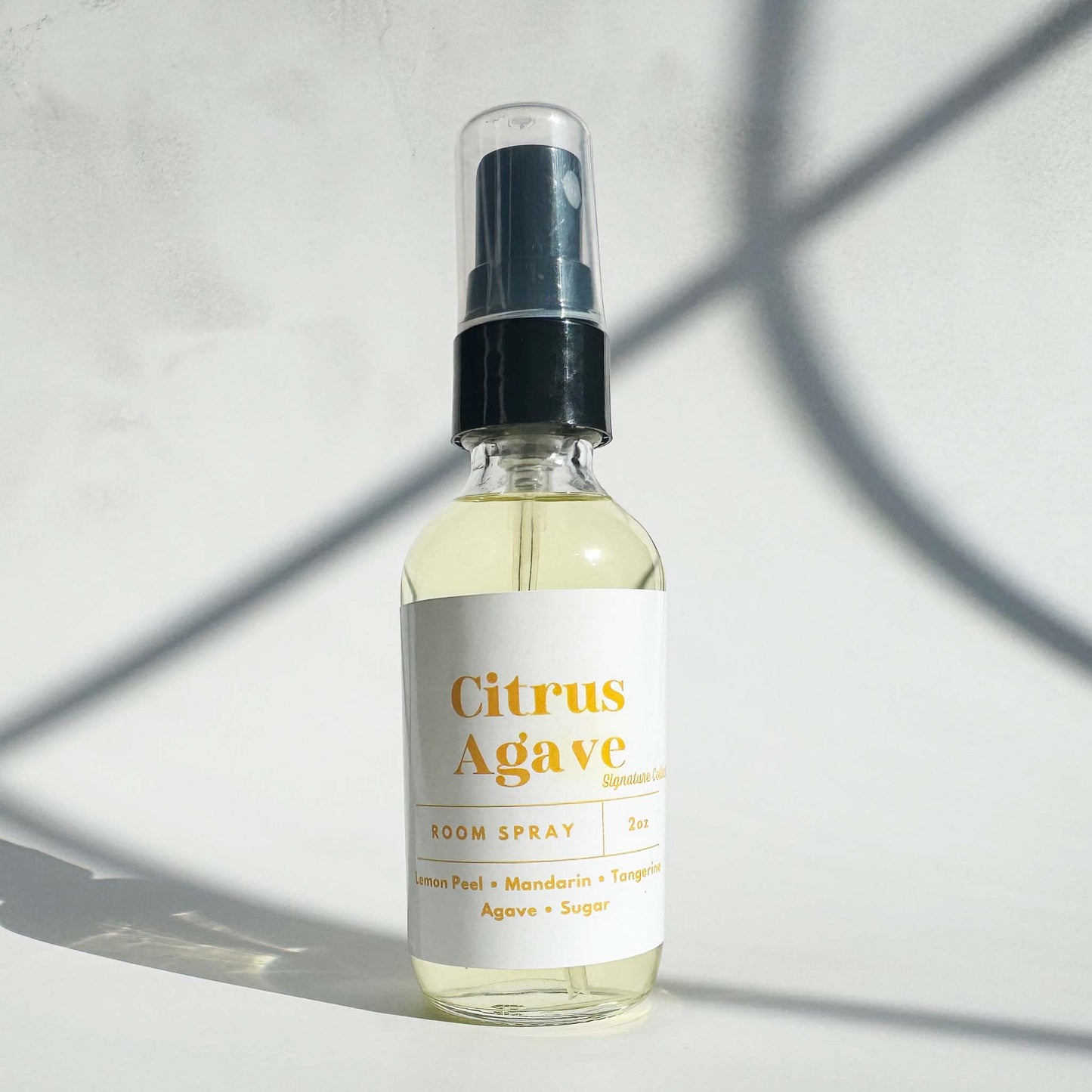 A zesty Citrus Agave room spray that energizes the space with vibrant, fresh scents.