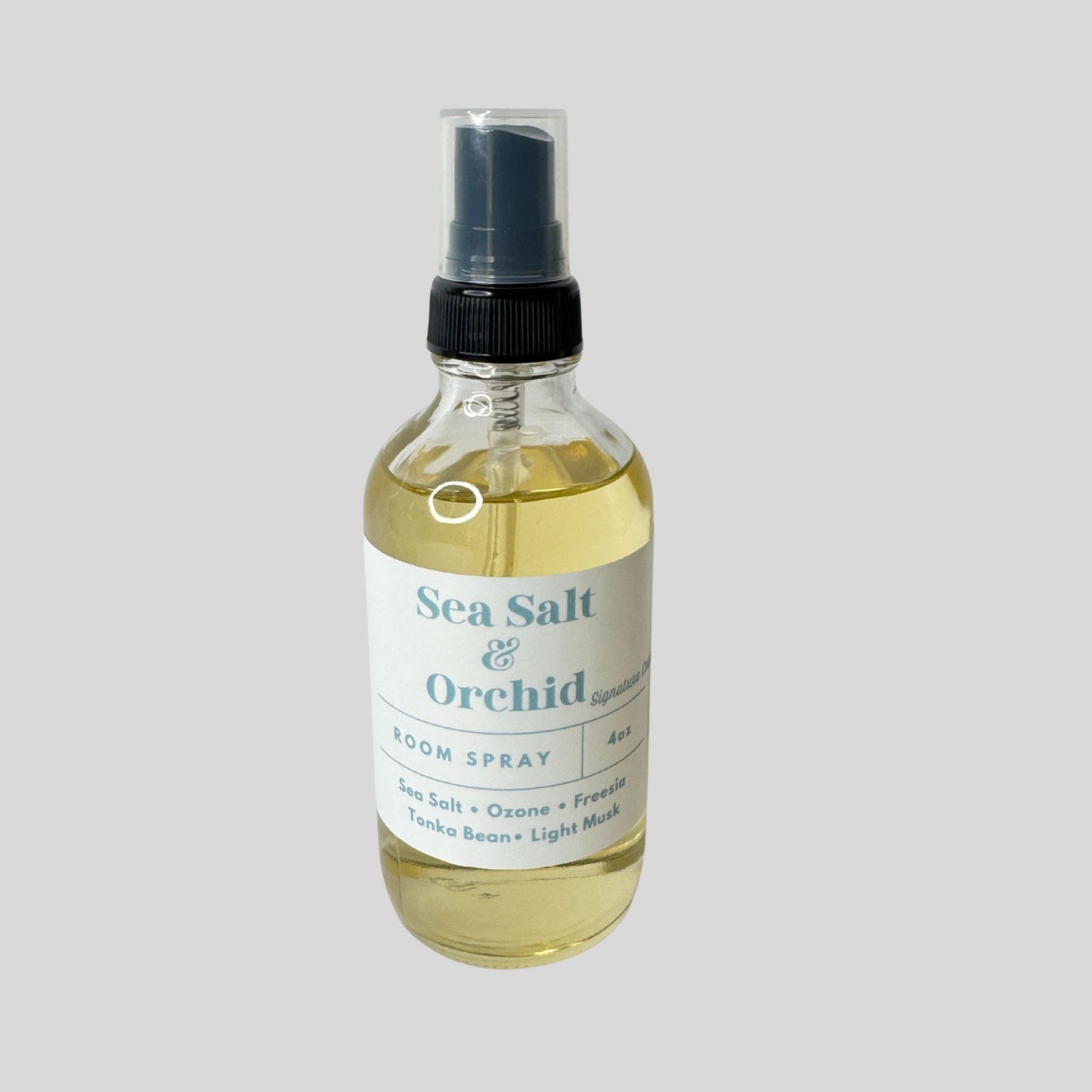 A calming Sea Salt Orchid room spray that blends fresh ocean breeze with floral sweetness.