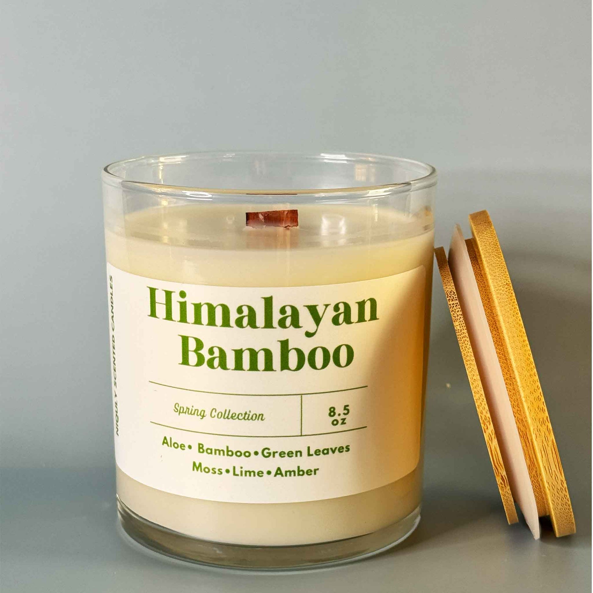 Himalayan Bamboo candle glowing with a fresh, earthy scent