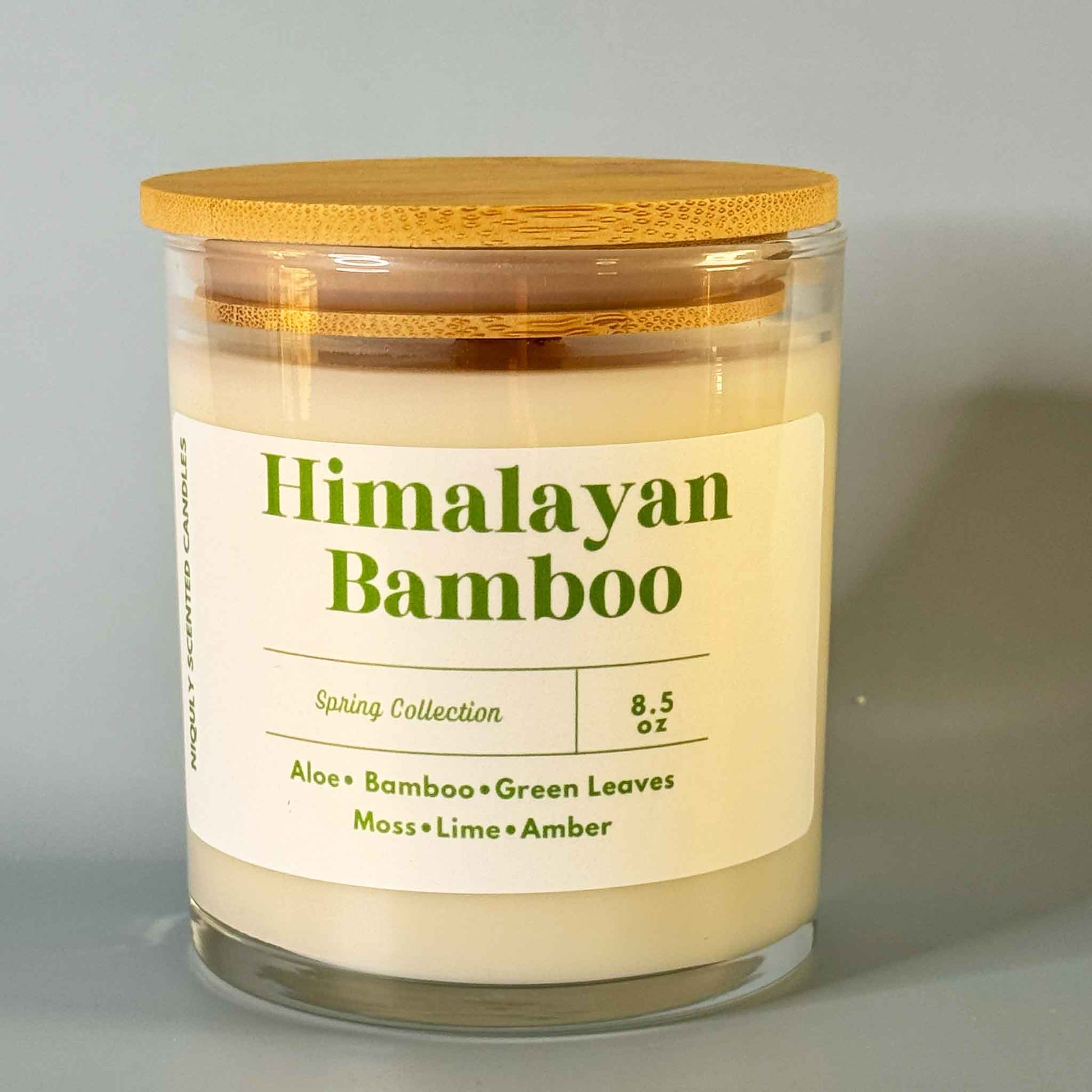 Fresh and calming Himalayan Bamboo candle in a glass jar.