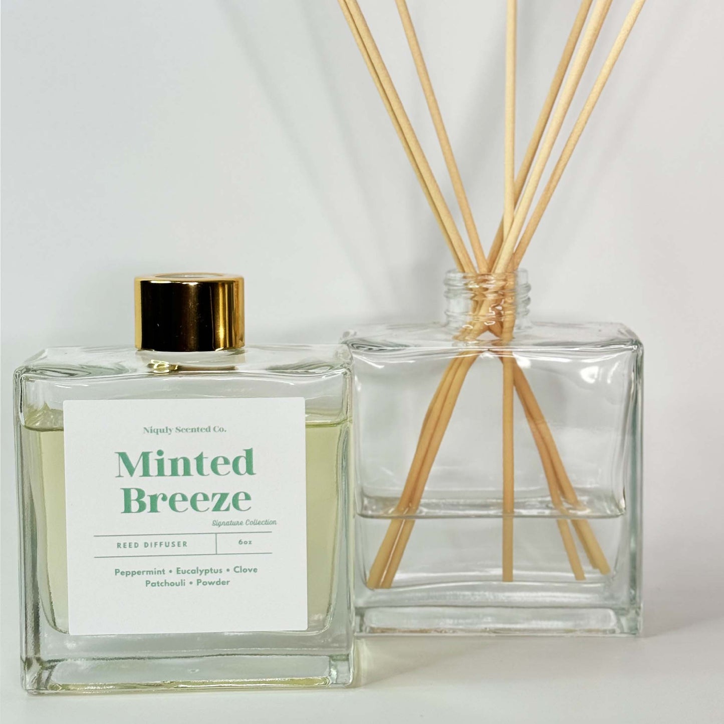 A refreshing Minted Breeze room spray that fills the air with cool, invigorating mint.