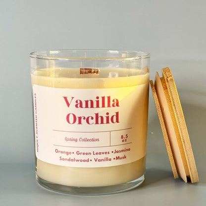 Vanilla Orchid candle casting a cozy, golden glow